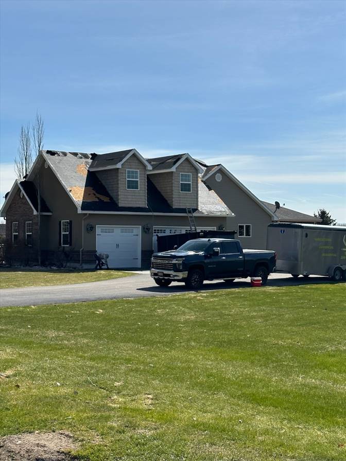 Residential asphalt shingle roof installed by Idaho Roofing